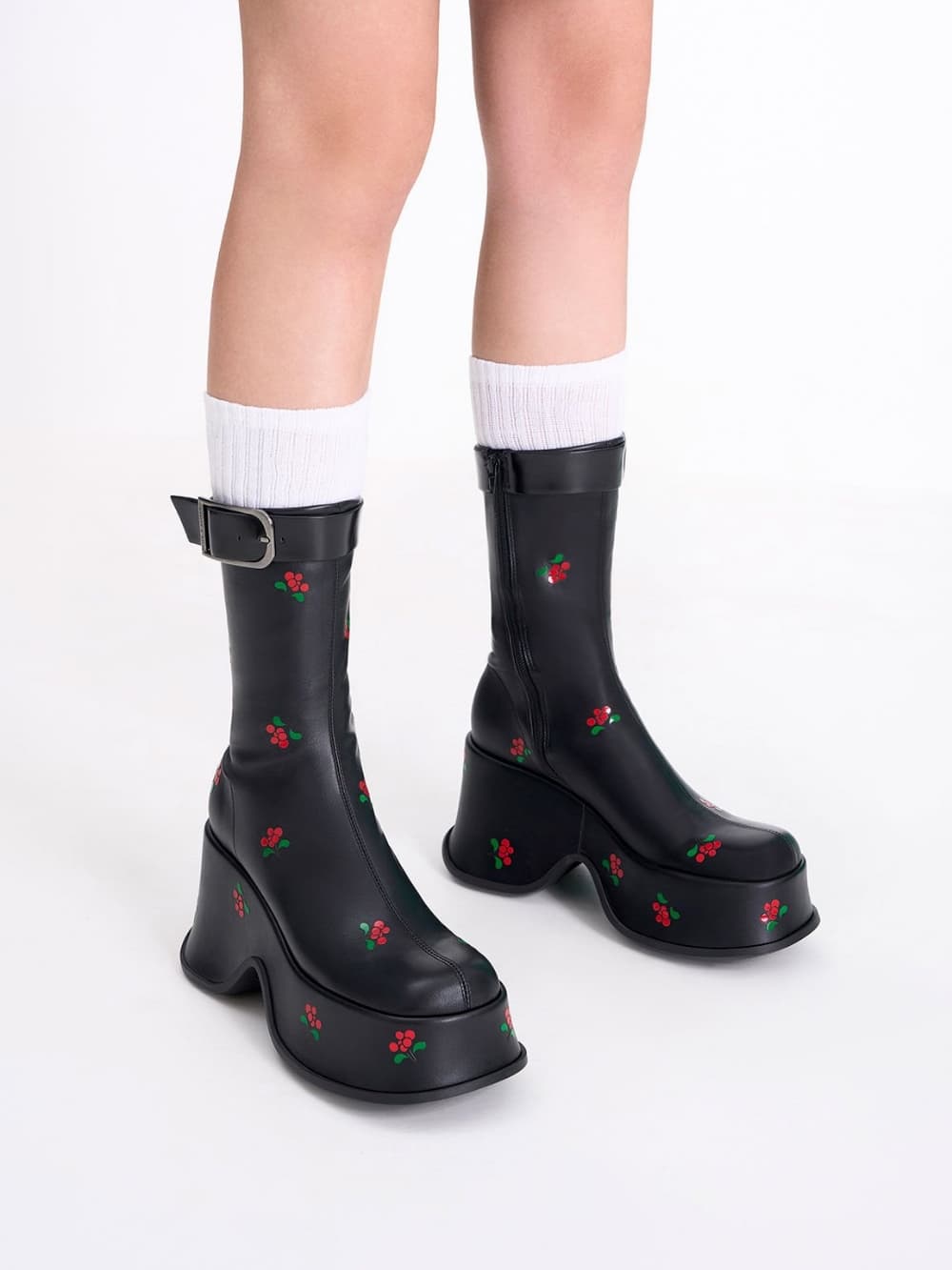 Women's black textured Carlisle floral platform boots - CHARLES & KEITH