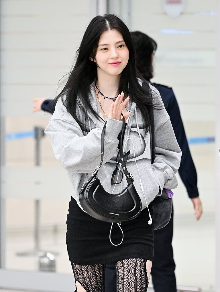 Women’s Petra curved shoulder bag in black, as seen on Han So Hee at Incheon International Airport on March 2nd, 2024 - CHARLES & KEITH