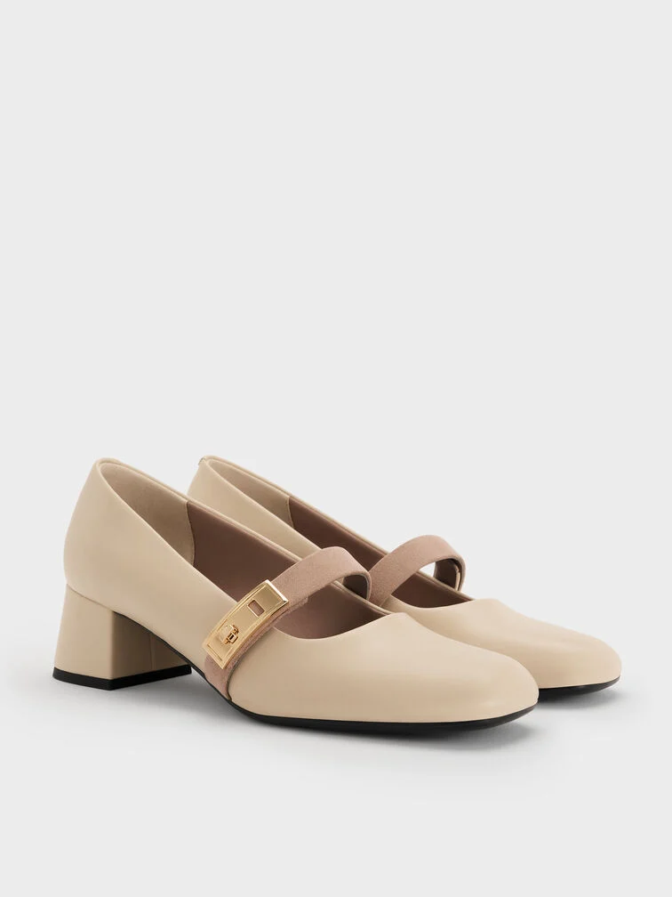 Mary Jane Pumps mit Blockabsatz, eine elegante Option für Smart-Casual-Looks.