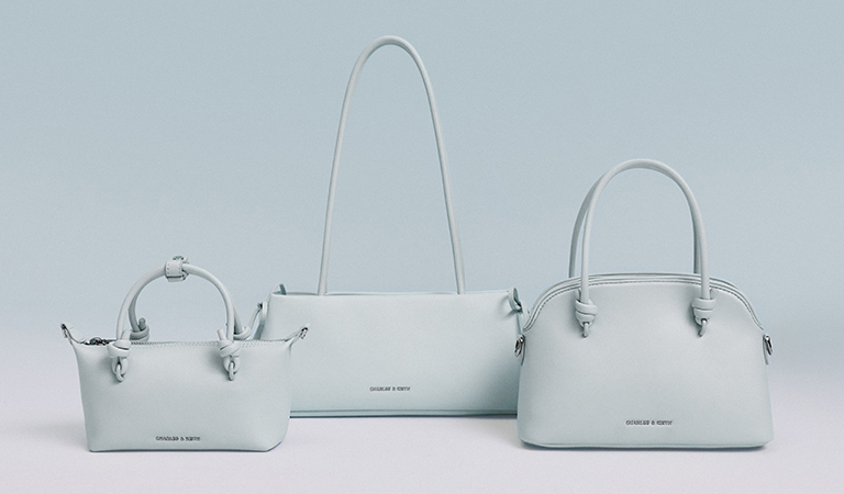 Women’s Hazel Bow Elongated Trapeze Shoulder Bag in Sea Salt Blue, Sammie Knotted-Handle Tote Bag in Sea Salt Blue and Sammie Knotted-Handle Bowling Bag in Sea Salt Blue - CHARLES & KEITH