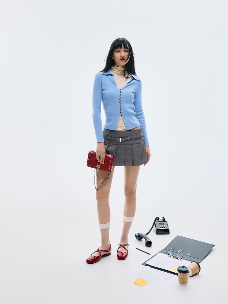 Red flats paired with the matching Arwen studded bag for a refined, coordinated look.