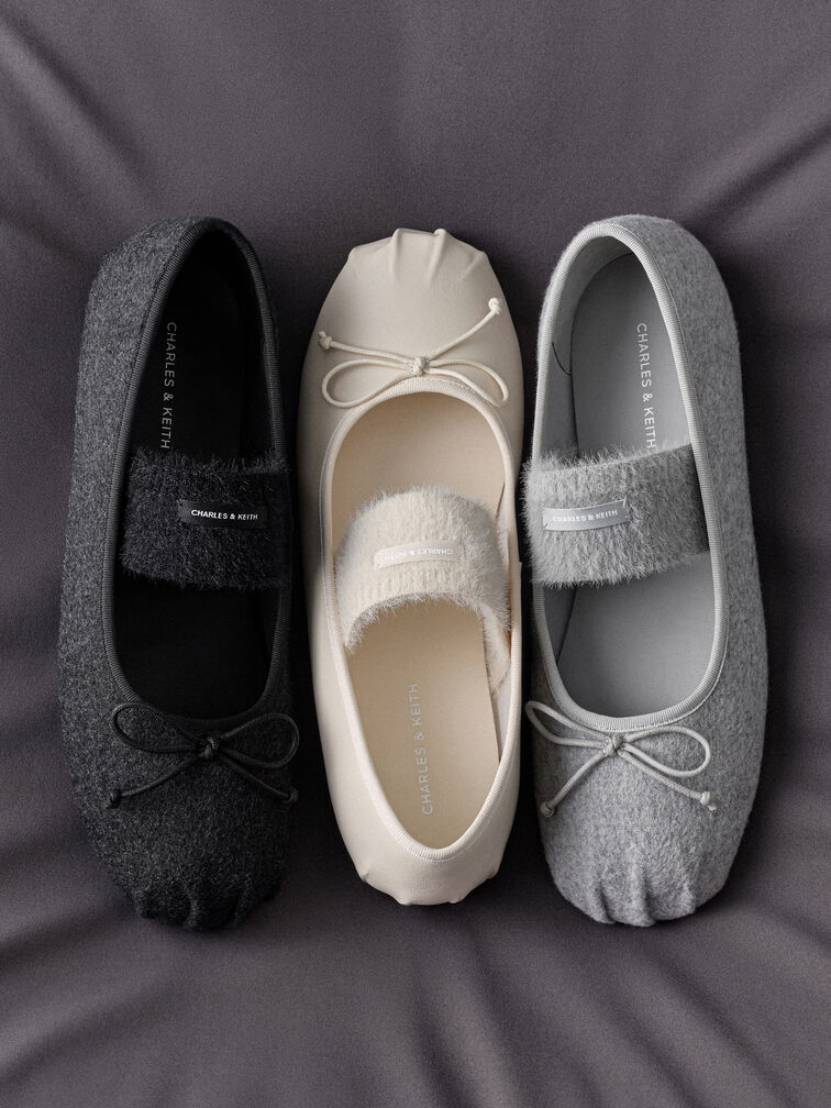 Mary Jane Ballerinas mit Schleifendetails, ideal für bequemes Tragen den ganzen Tag.