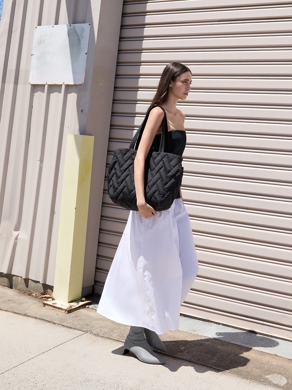Women’s nylon chevron tote bag in jet black and Lorde blade-heel pointed-toe calf boots in grey - CHARLES & KEITH