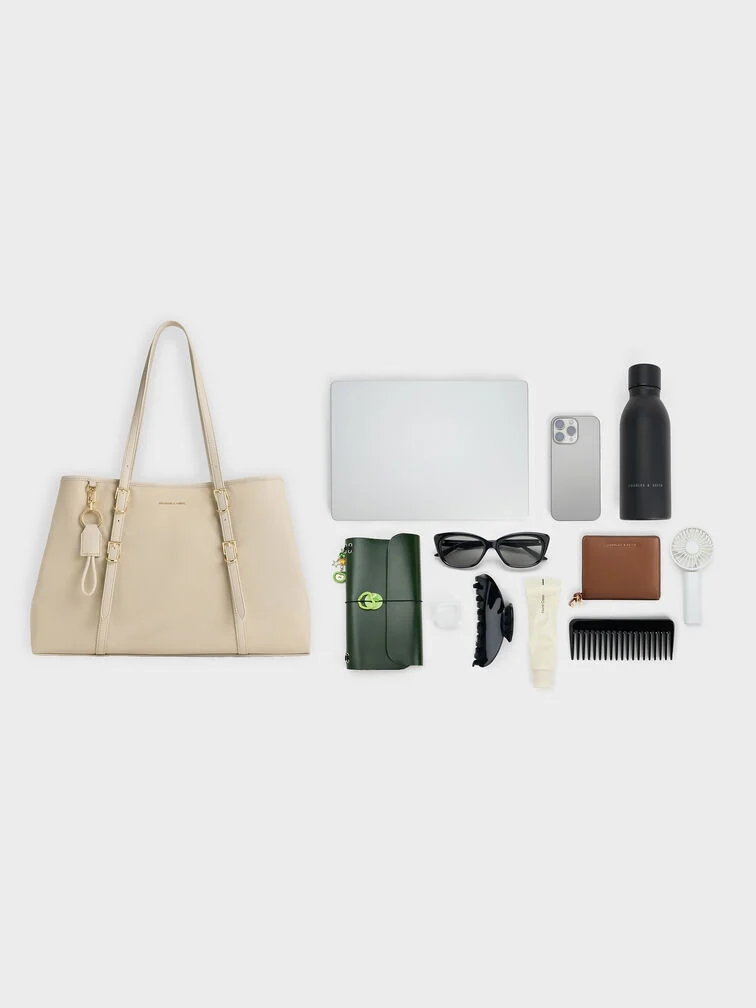 A sample overview of what fits in the Levy nylon tote bag.