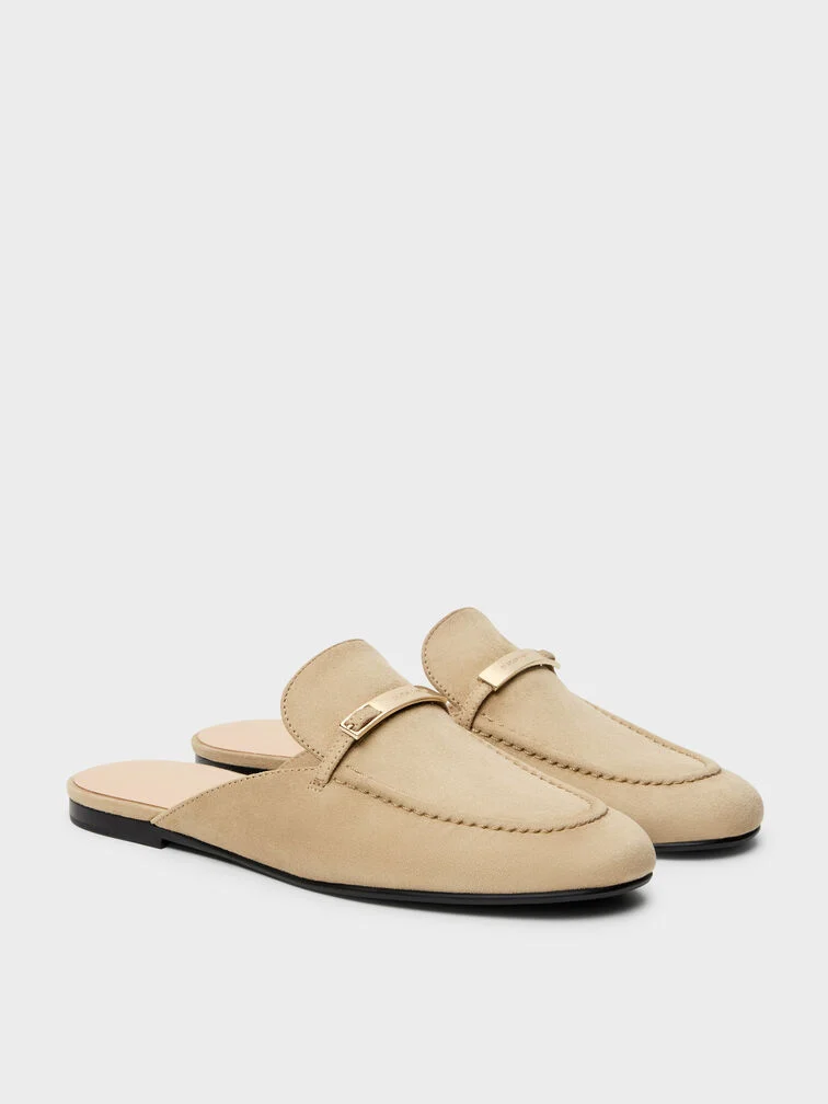 Klassische Penny Loafer zeichnen sich durch charakteristische Riemen mit Aussparung über dem Rüst aus.