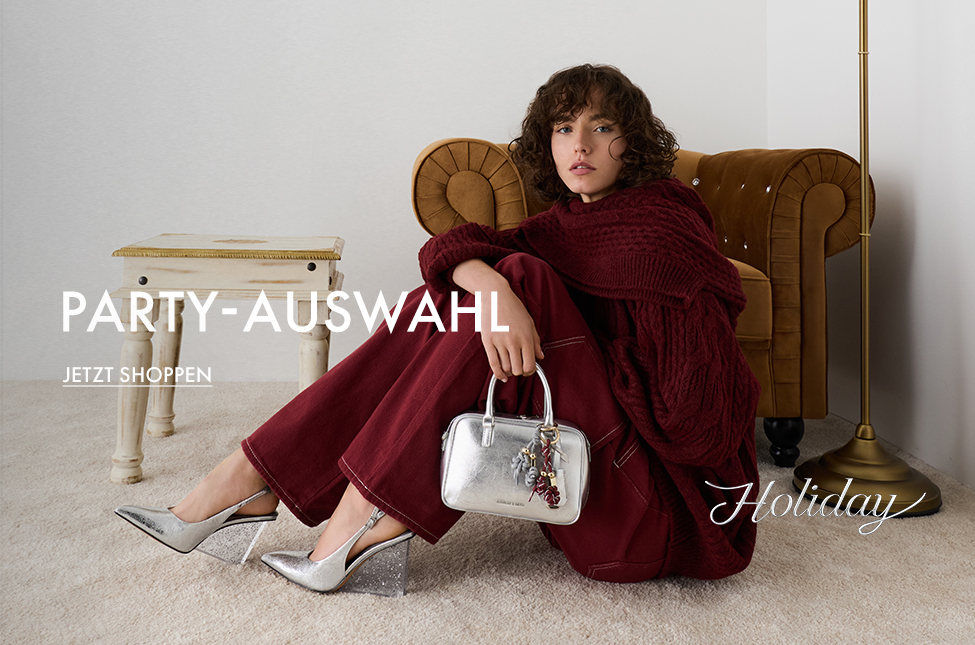 Silberne Wedge-Mules in Metallic-Optik mit gesprenkeltem Absatz und Crinkle-Effekt
Silberne Slingback-Wedges in Metallic-Optik mit gesprenkeltem Absatz und Crinkle-Effekt