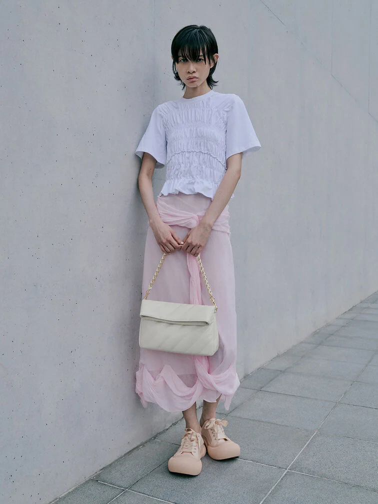 Damesschoudertas Fawn met panelen en kettingriem, crèmekleurig - CHARLES & KEITH 