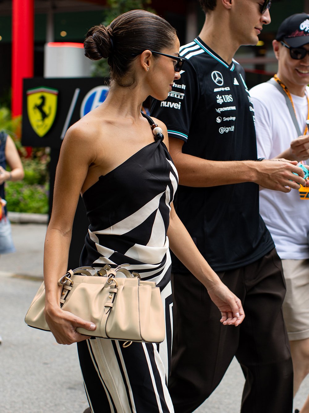 Women’s Britton ruched elongated shoulder bag & Pauline patent crossover slingback kitten heels, as seen on Carmen Montero Mundt – CHARLES & KEITH