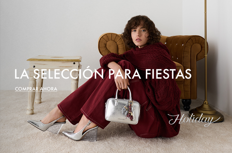 Mules de cuña plateadas metalizadas con tacón moteado y efecto arrugado
Cuñas destalonadas con tira posterior metalizadas plateadas con tacón moteado y efecto arrugado