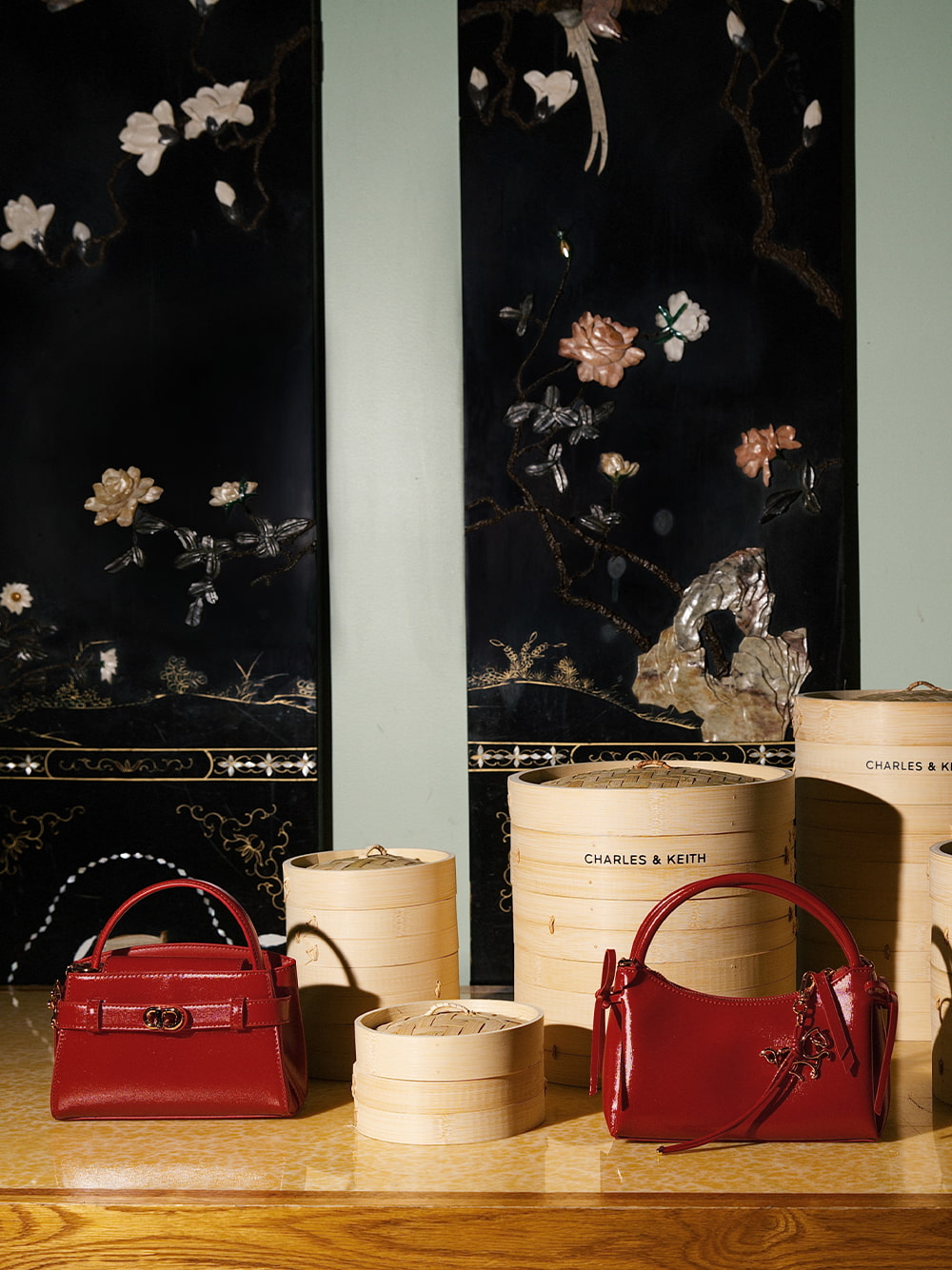 Aubrielle Horse-Motif Top Handle Bag and Hazel Bow Horse-Motif Top Handle Bag, both in red - CHARLES & KEITH