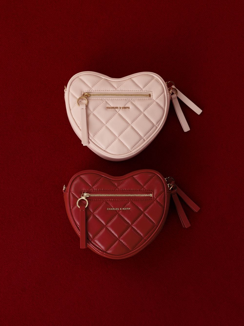 Women’s soft pink and tomato red Paffuto quilted heart chain-strap crossbody bag - CHARLES & KEITH