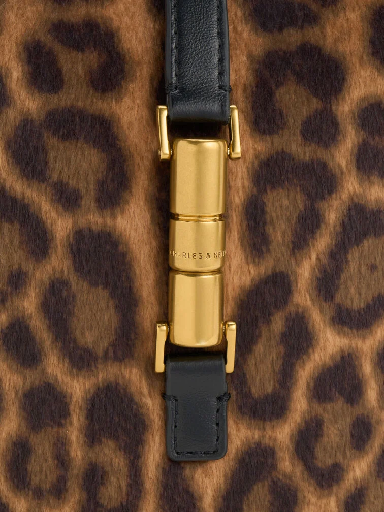 Featuring small, dense spots, leopard print is a relatively subtle animal print that is wearable and easy to style.