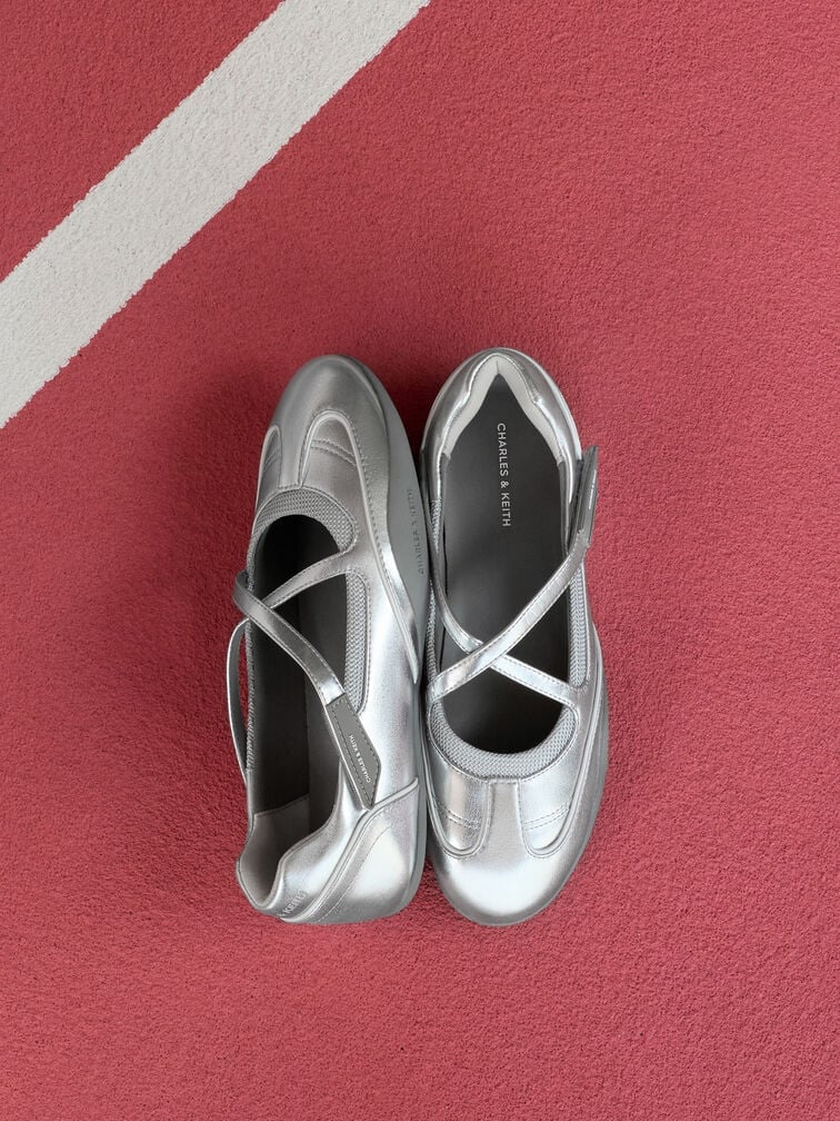 A pair of Mary Jane sneakers offers comfort and style.