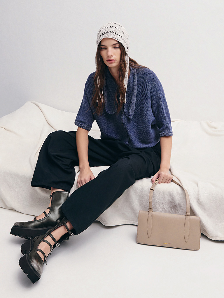  — CHARLES & KEITH