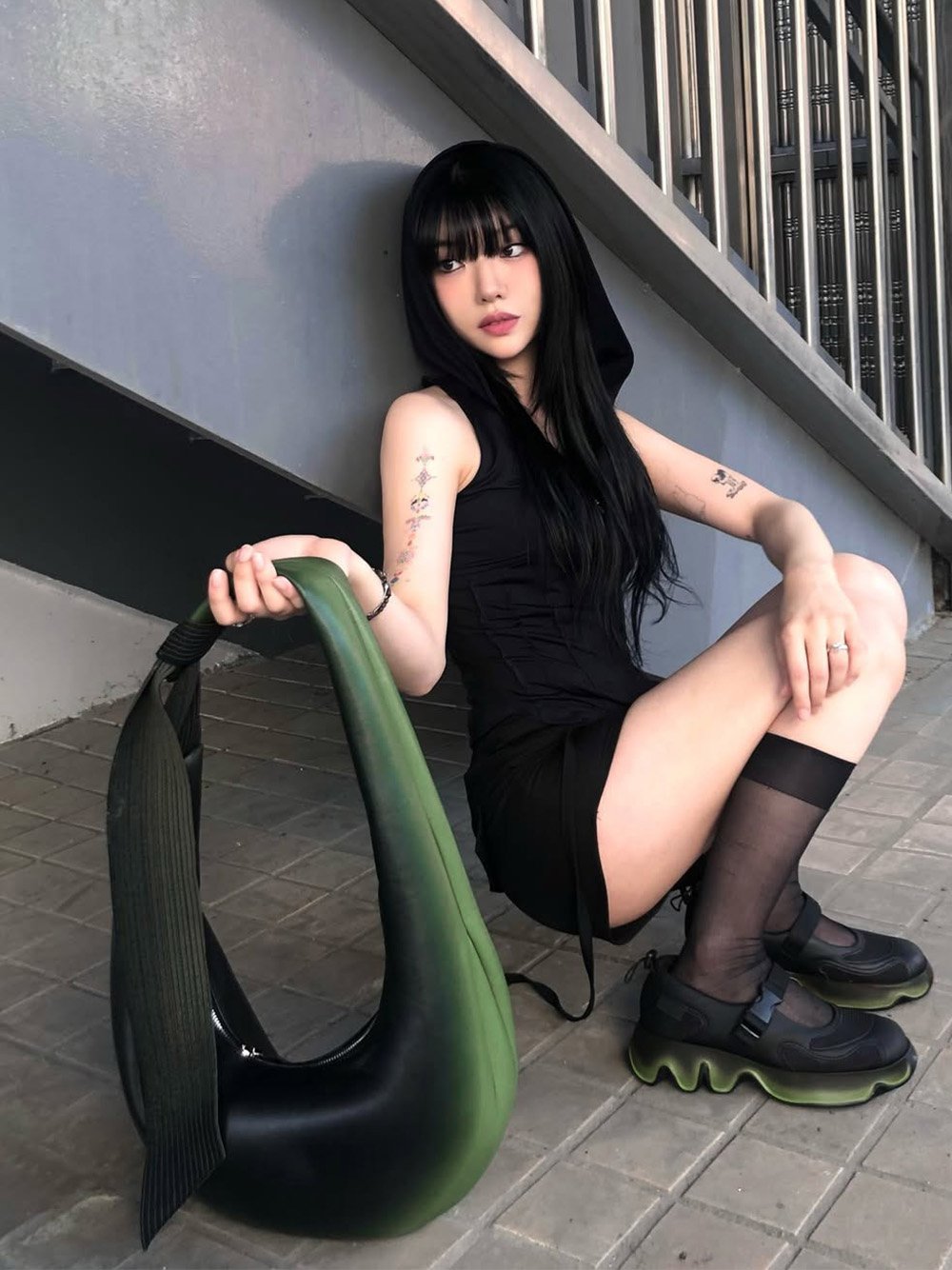 Women’s Toni gradient knotted crescent hobo bag and mesh gradient wave Mary Jane sneakers, as seen on Seomi Son