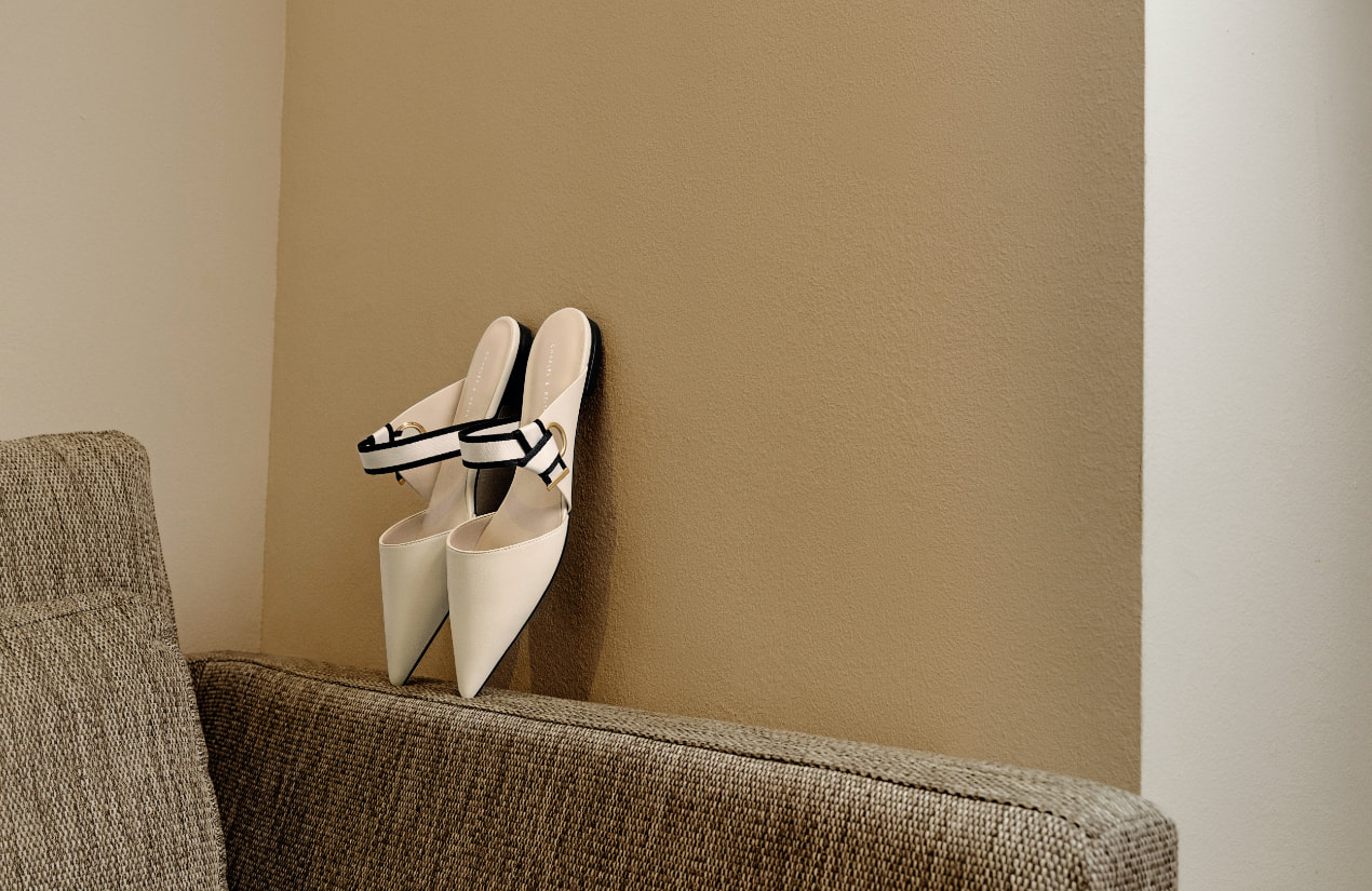 Women’s pointed toe fabric strap mules in chalk - CHARLES & KEITH