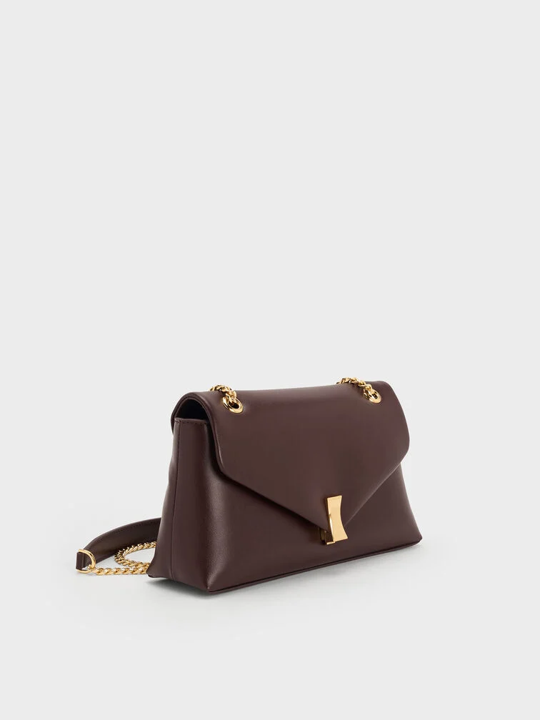 Plum chain-strap bag, an elevated everyday option. 
