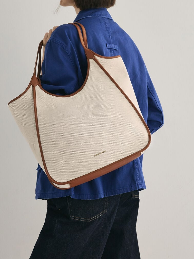 Slouchy Canvas Tote Bag mit Doppelhenkeln und Kontrast-Besatz.