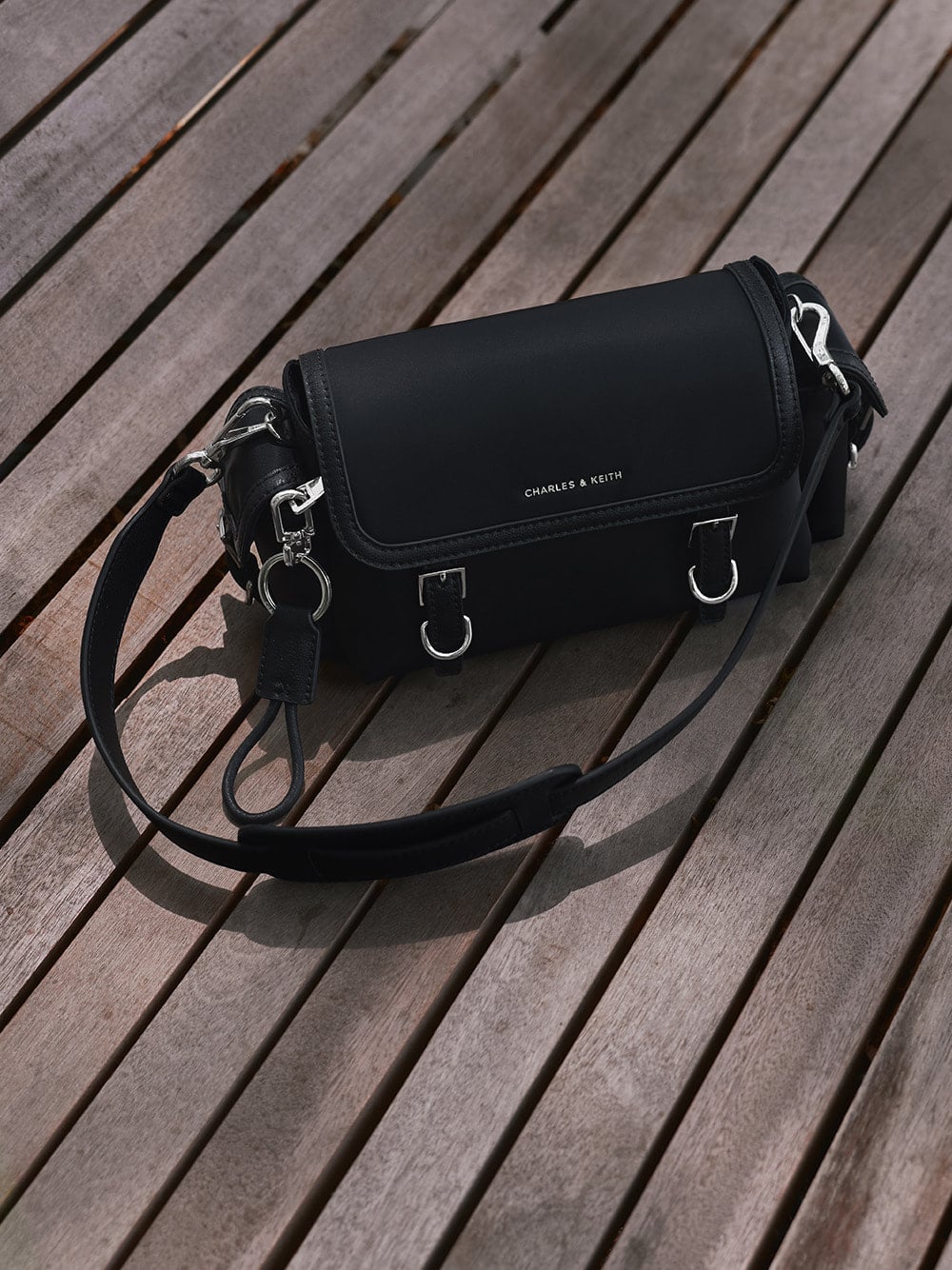 Women's Levy Nylon Buckled Crossbody Bag in noir - CHARLES & KEITH