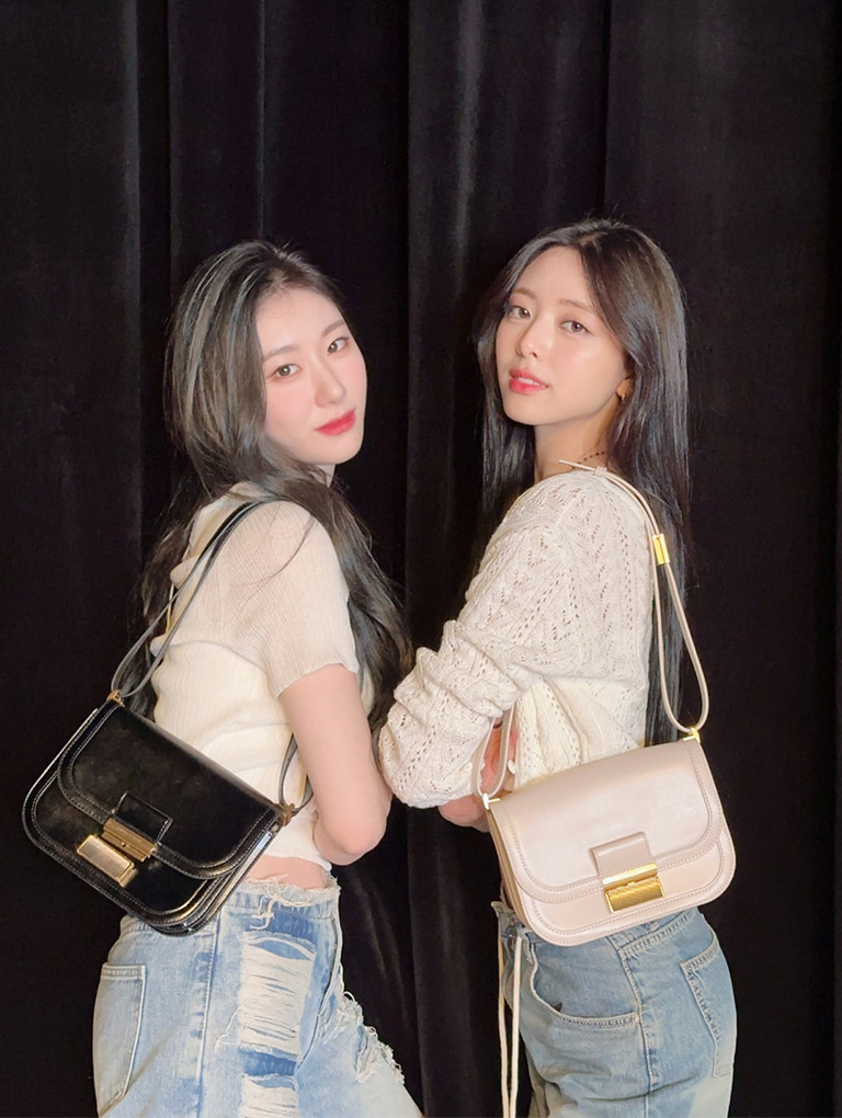 Women’s Charlot bag in black and ivory, as seen on Chaeyeong and Yuna - CHARLES & KEITH