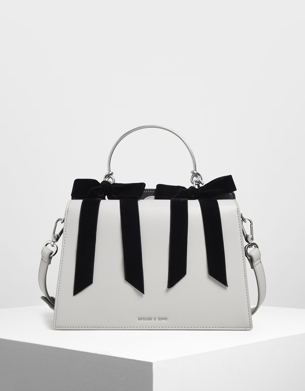 charles and keith bow bolsa
