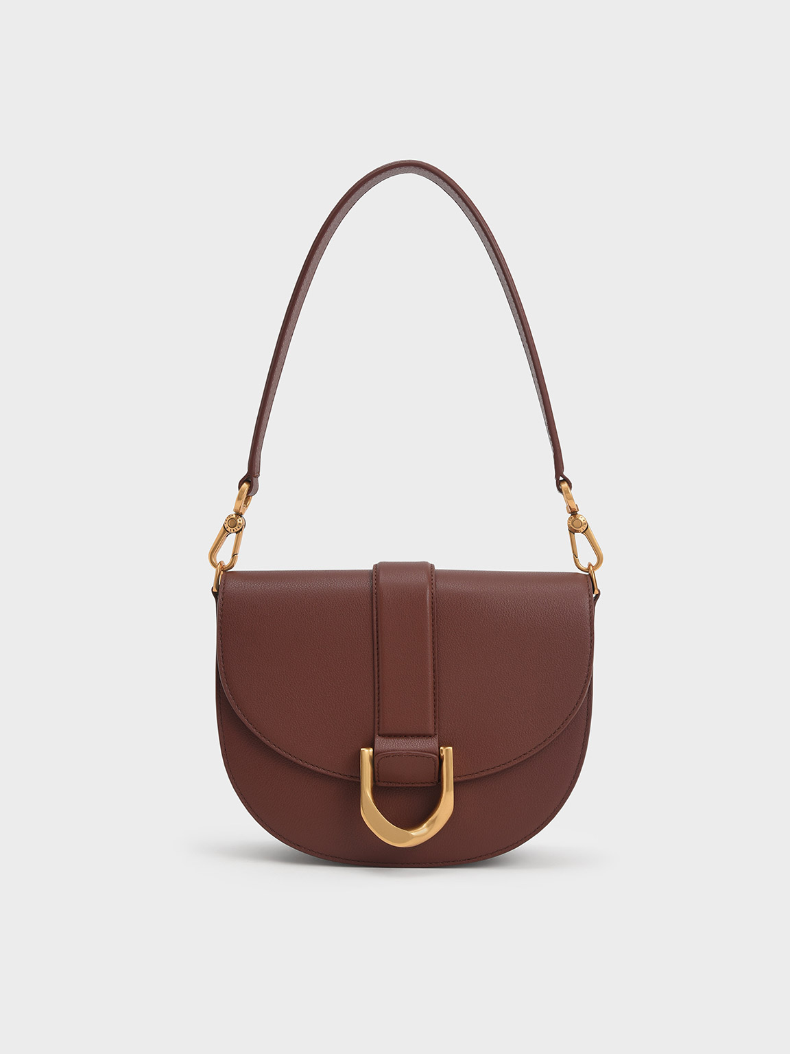 Brown Gabine Leather Saddle Bag​ | CHARLES &amp; KEITH